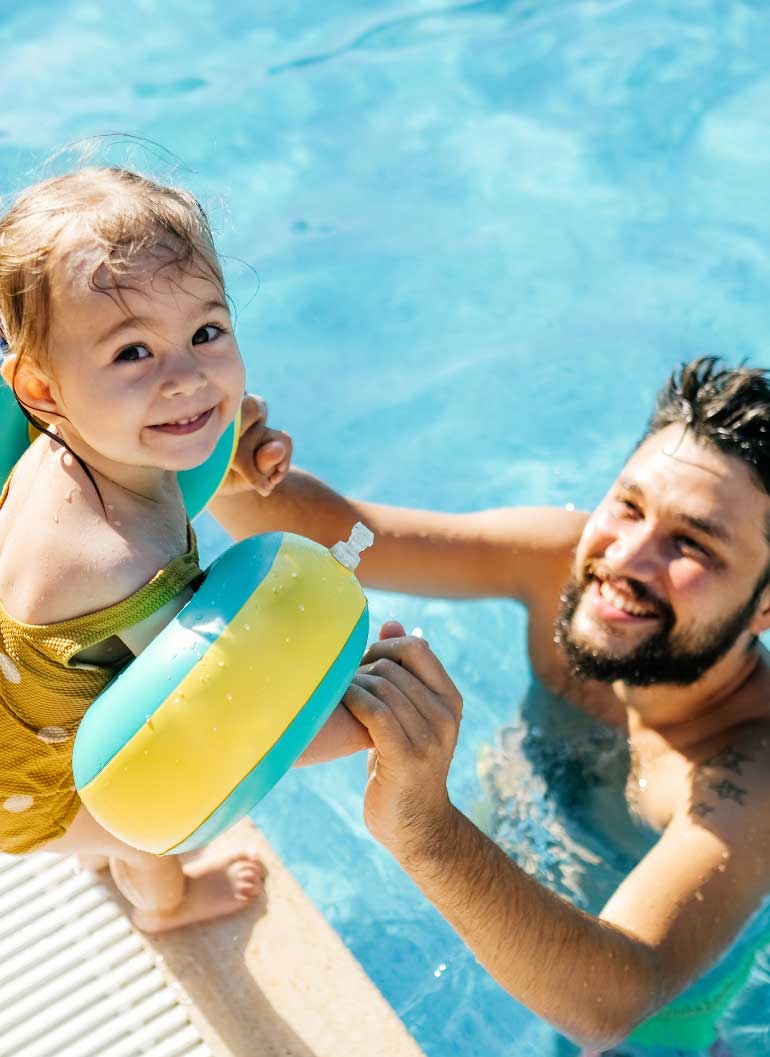 daughter-and-dad-in-pool